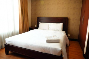 2BR Prestige Essence Dharmawangsa Apartment By Travelio